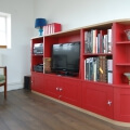 Bespoke media unit with curved corners and oak top