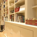 Large hallway library with storage cupboards - view 2