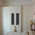 Large wall-to-wall fitted breakfront wardrobe
