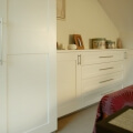 Attic wardrobe with chest of drawers - part view