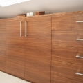 Wardrobe and sideboard in walnut - part view